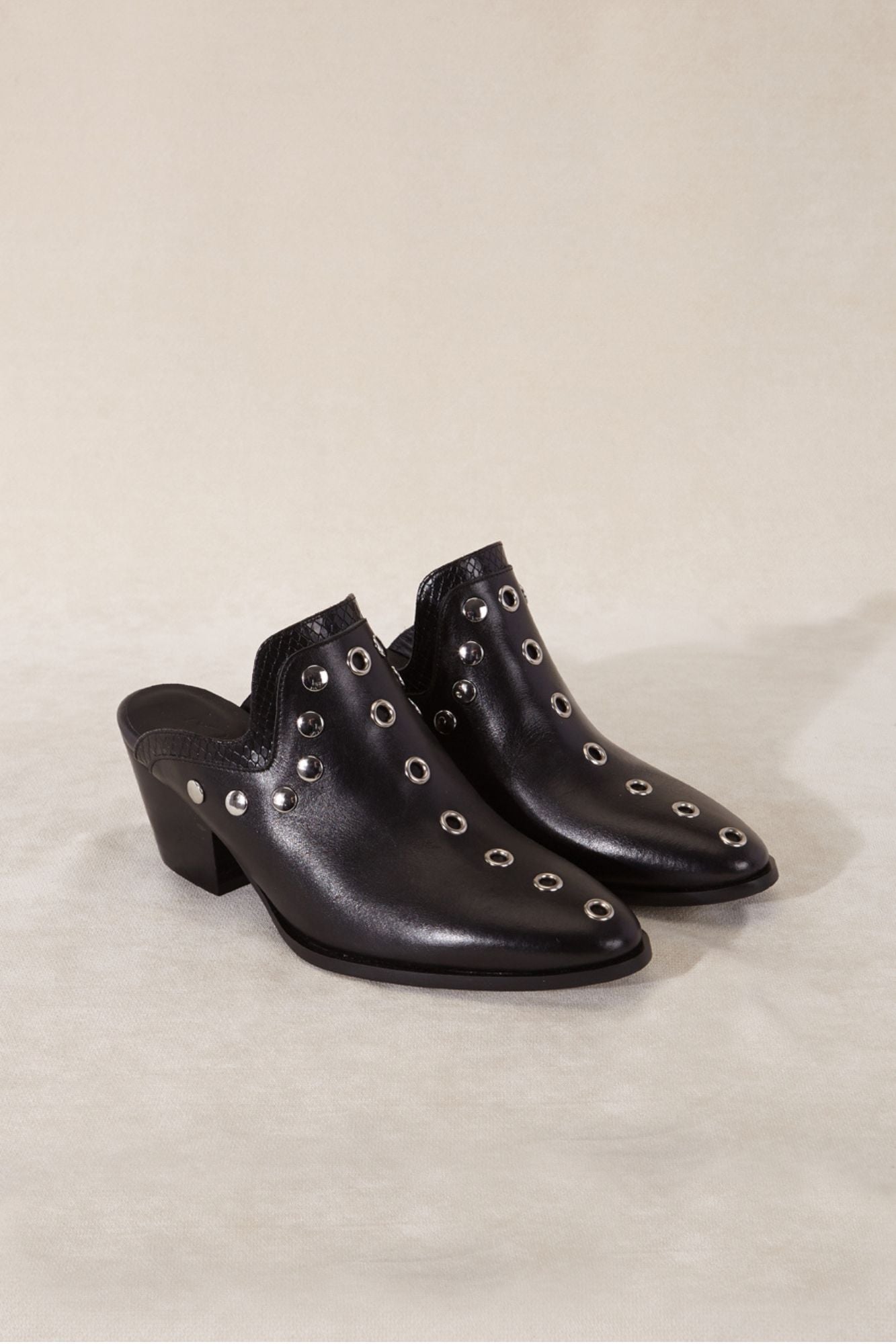 Black leather clogs