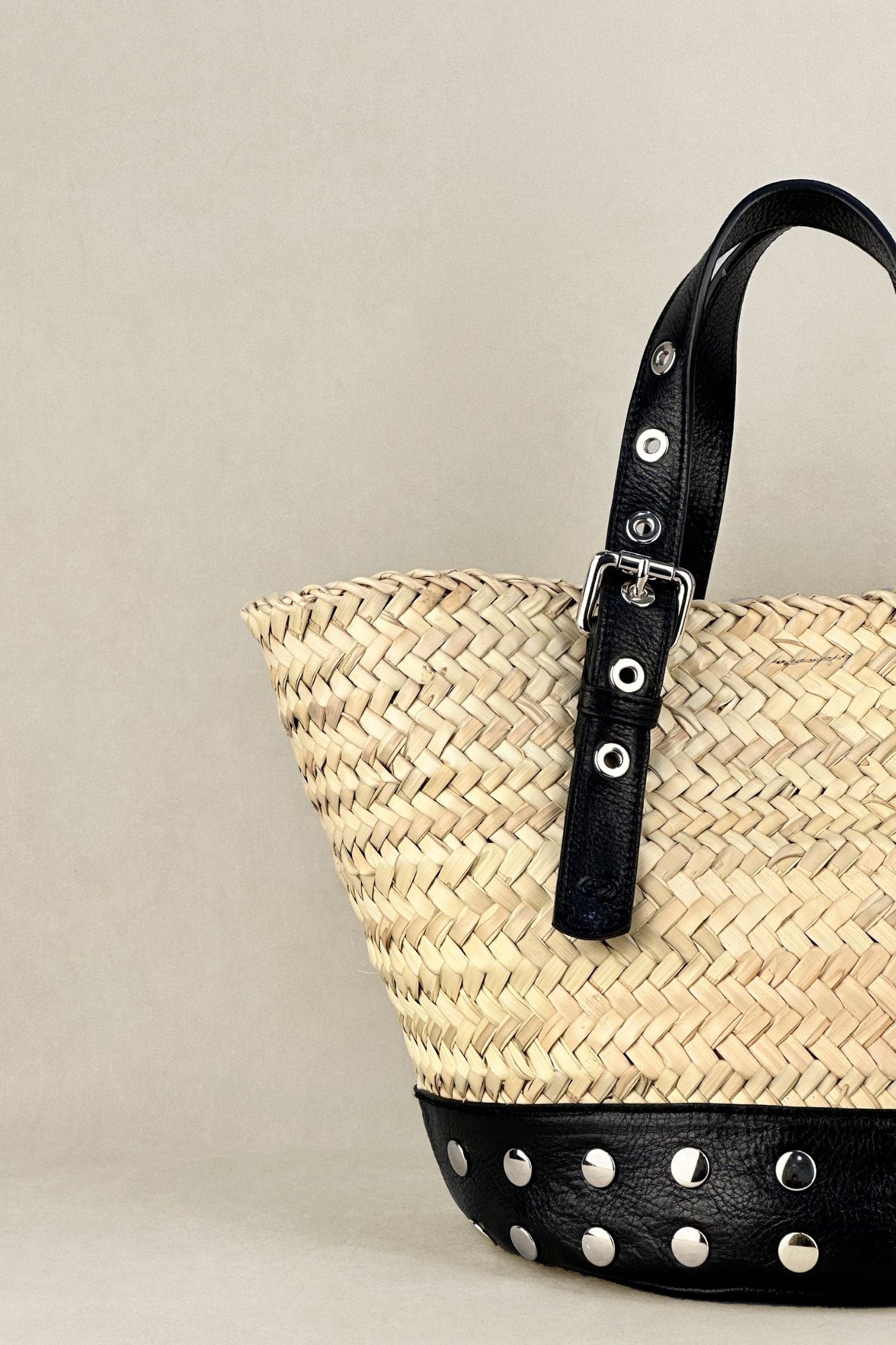 BLACK STUDDED PALM BUCKET BAG