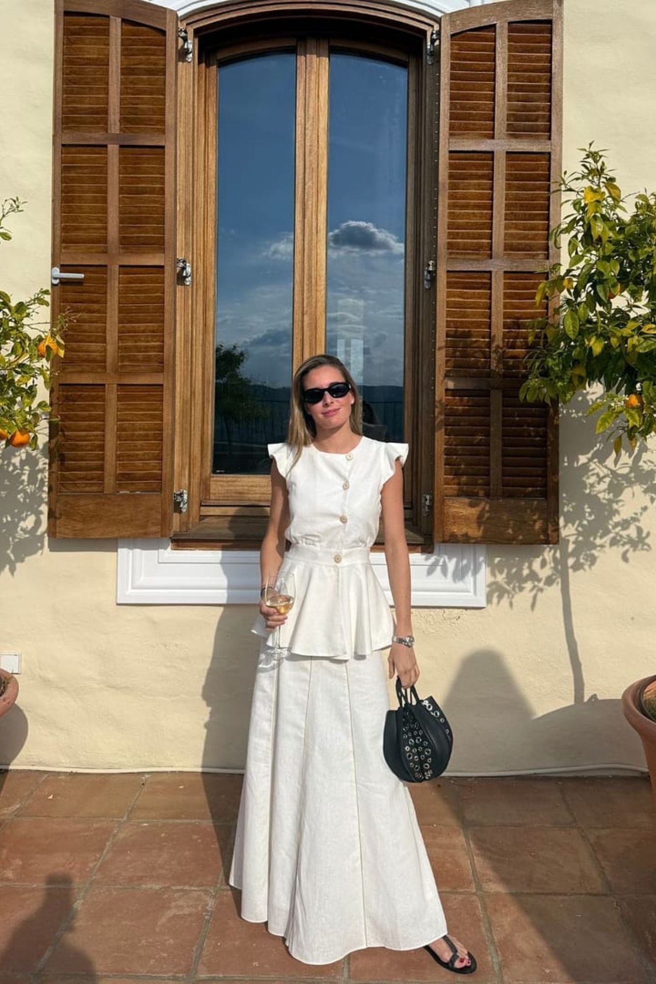 BOLSO DINSUM NEGRO TACHAS