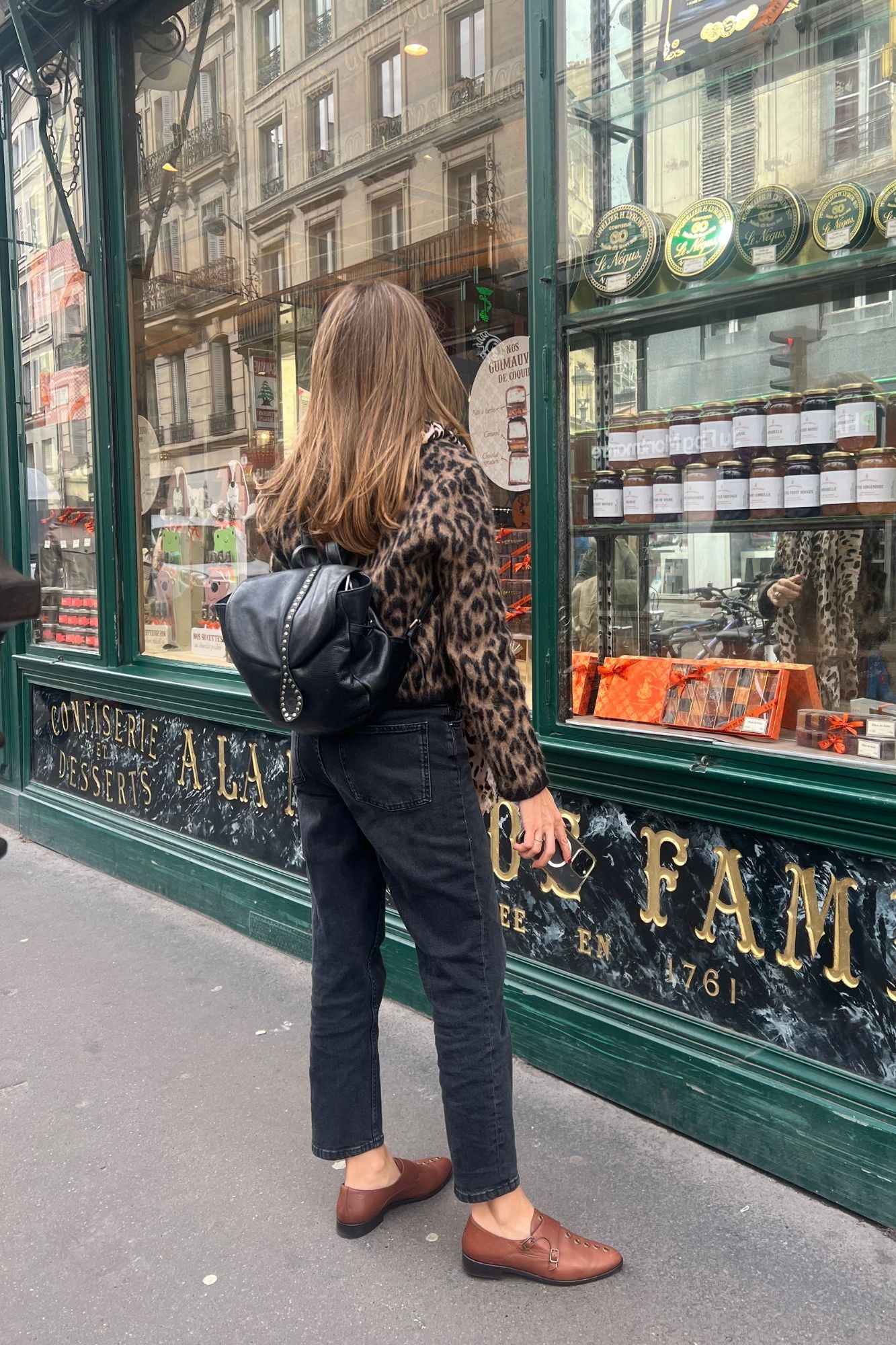 BLACK BACKPACK WITH GOLD STUDS