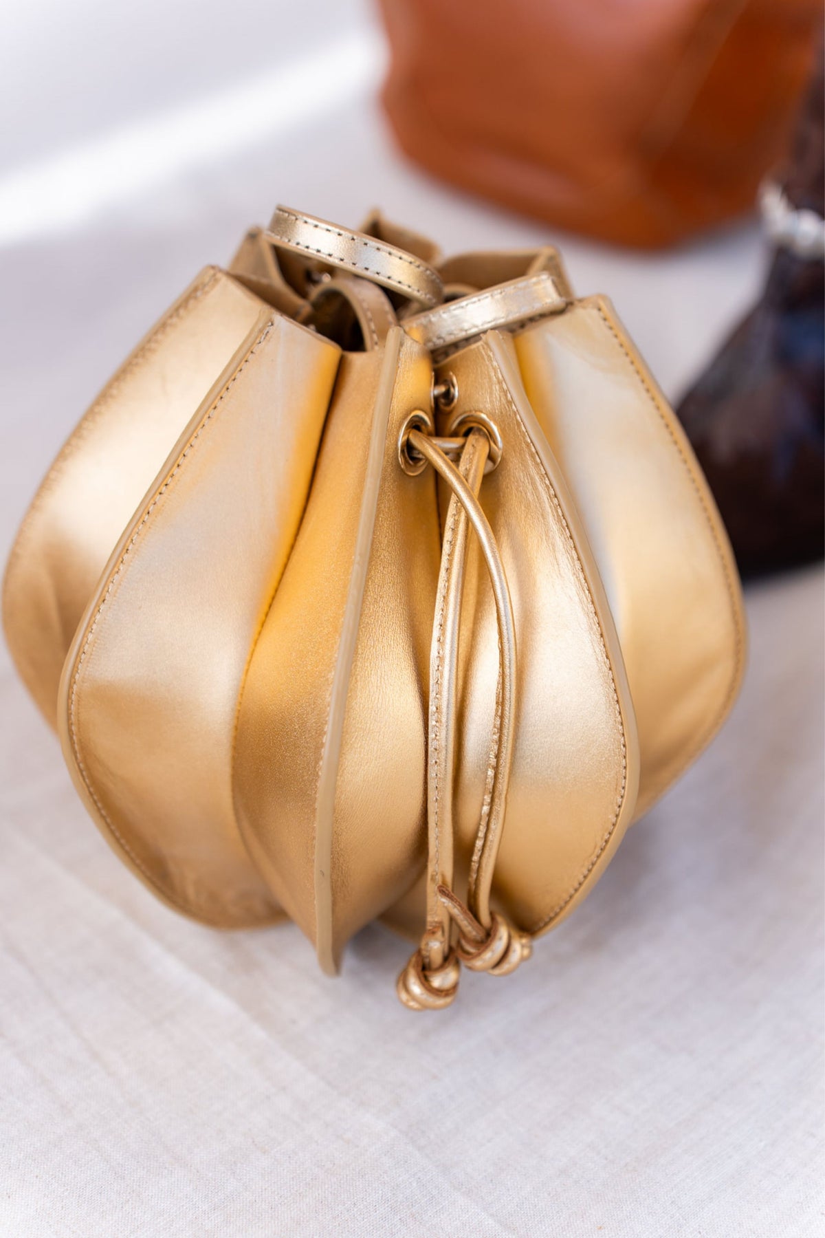 BOLSO DINSUM ORO