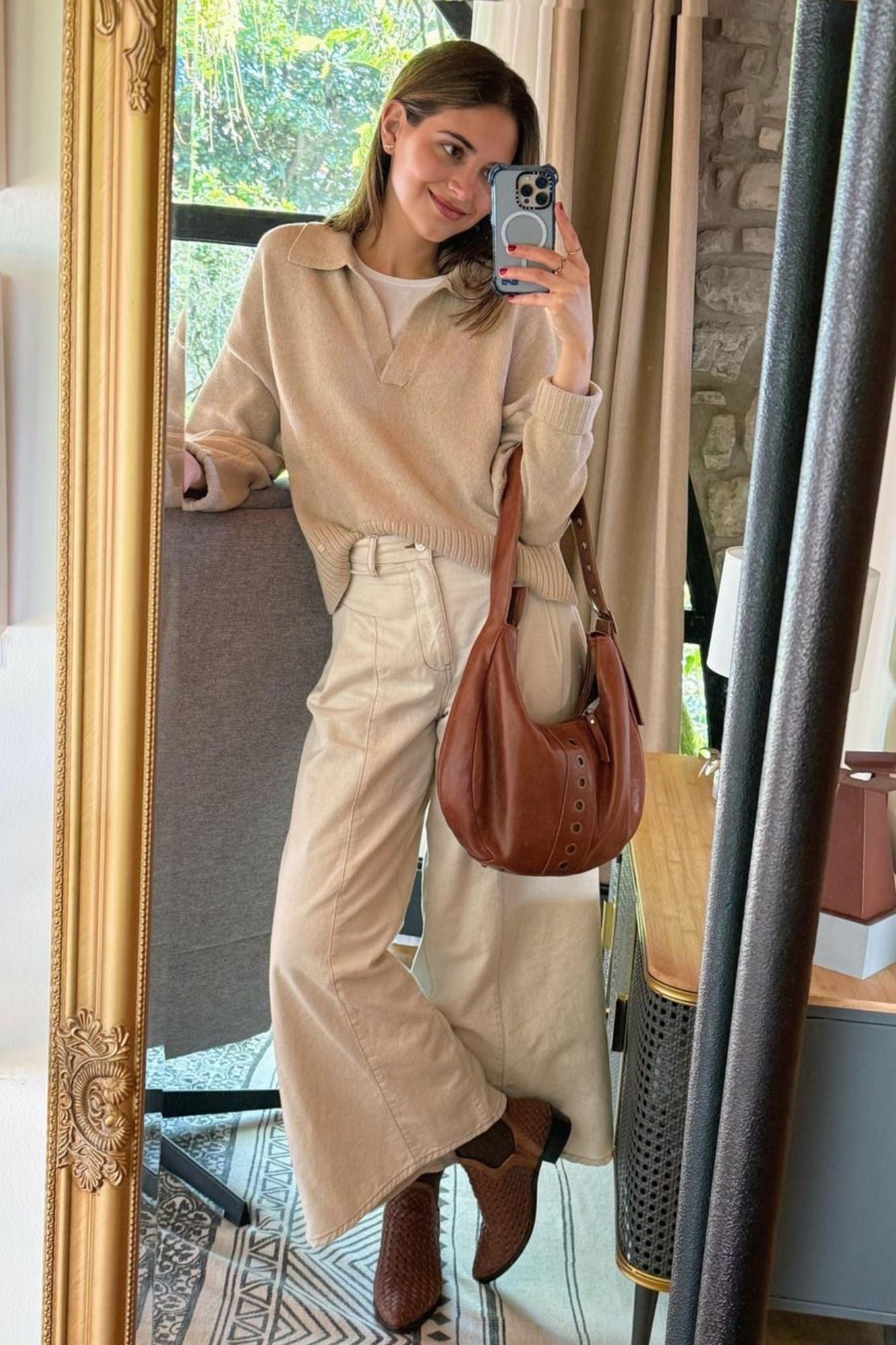 BOLSO HEREA TACHAS CUERO