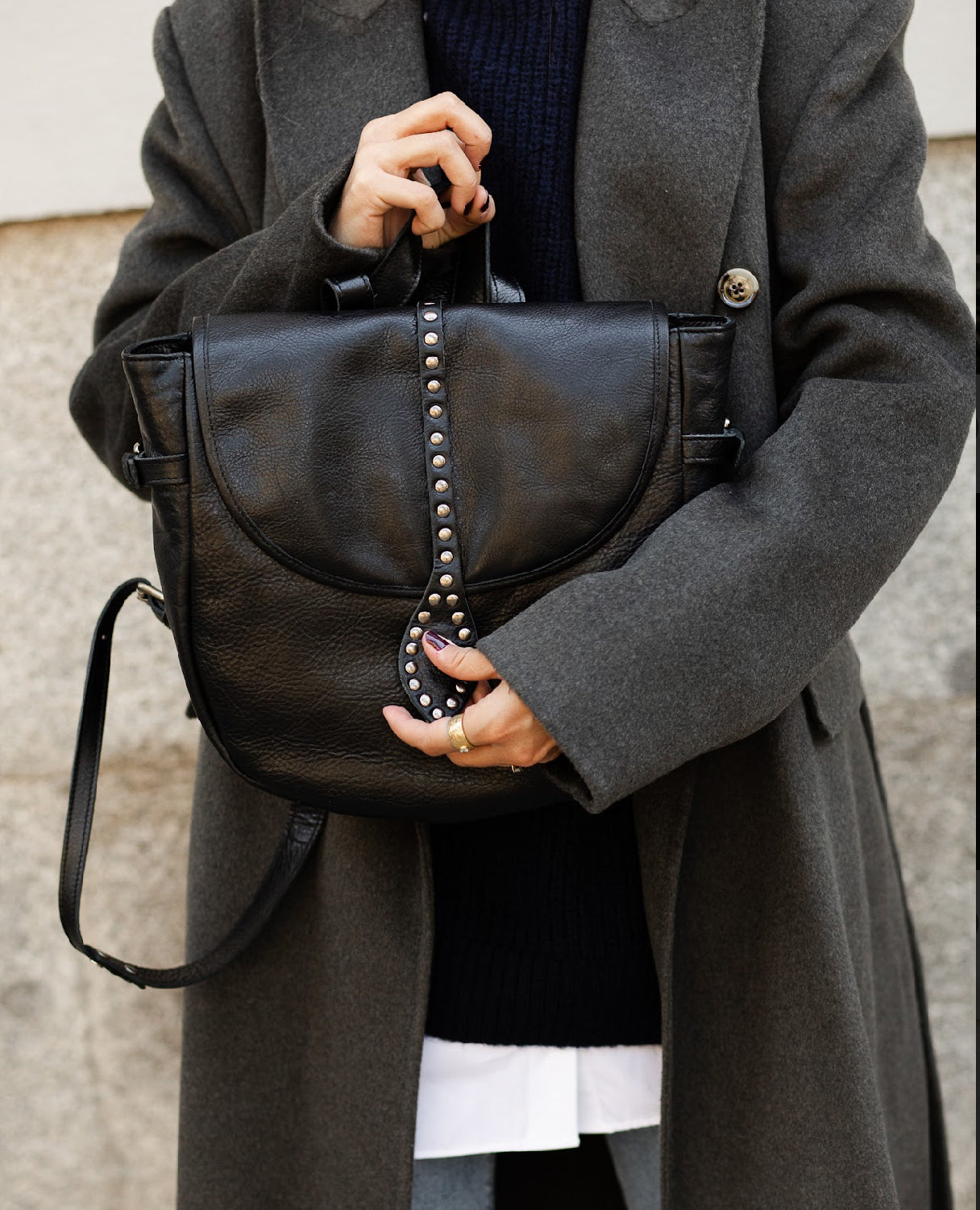 BLACK BACKPACK WITH GOLD STUDS