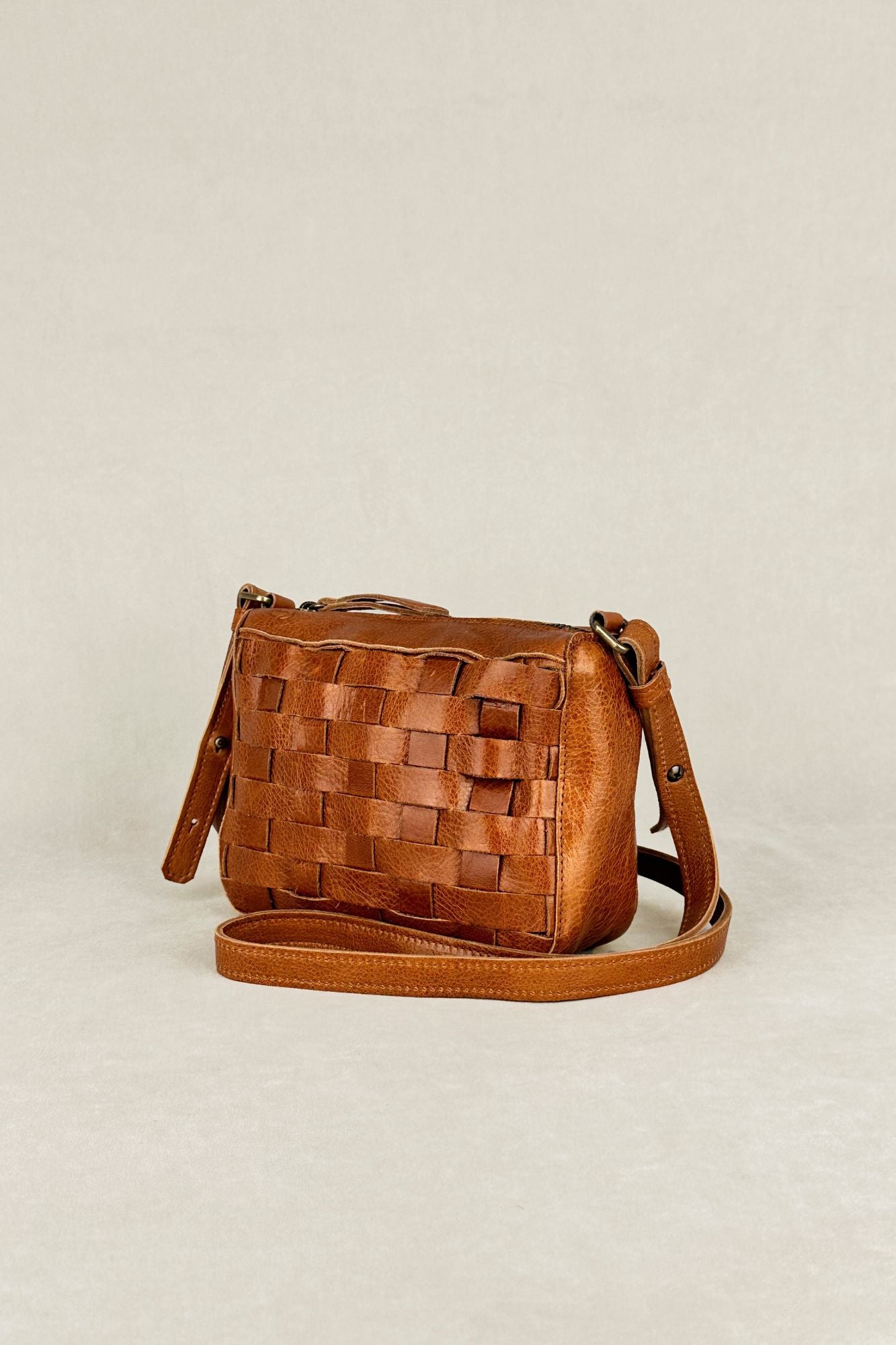 BRAIDED LEATHER CROSSBODY BAG