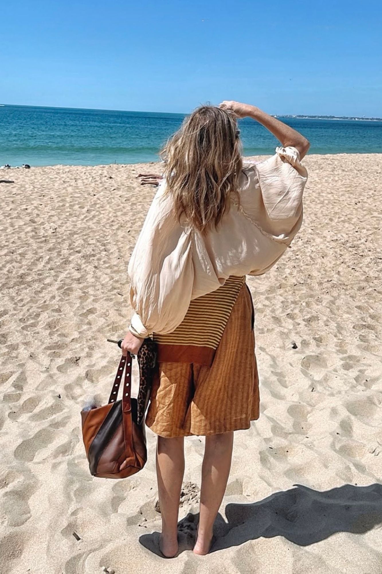 BOLSO BUCKET COMBINADO CUERO