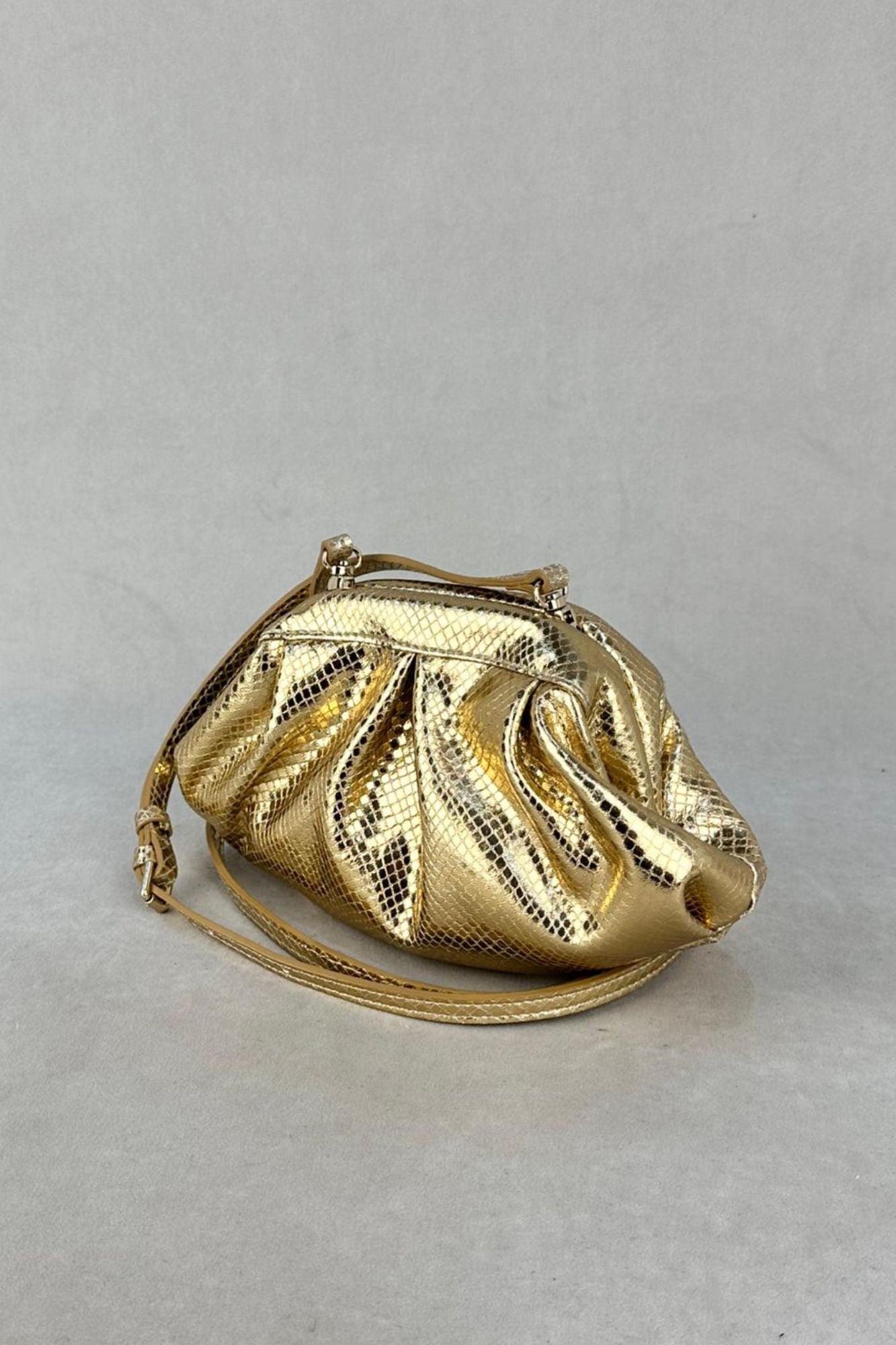 BOLSO CLUTCH ORO SNAKE