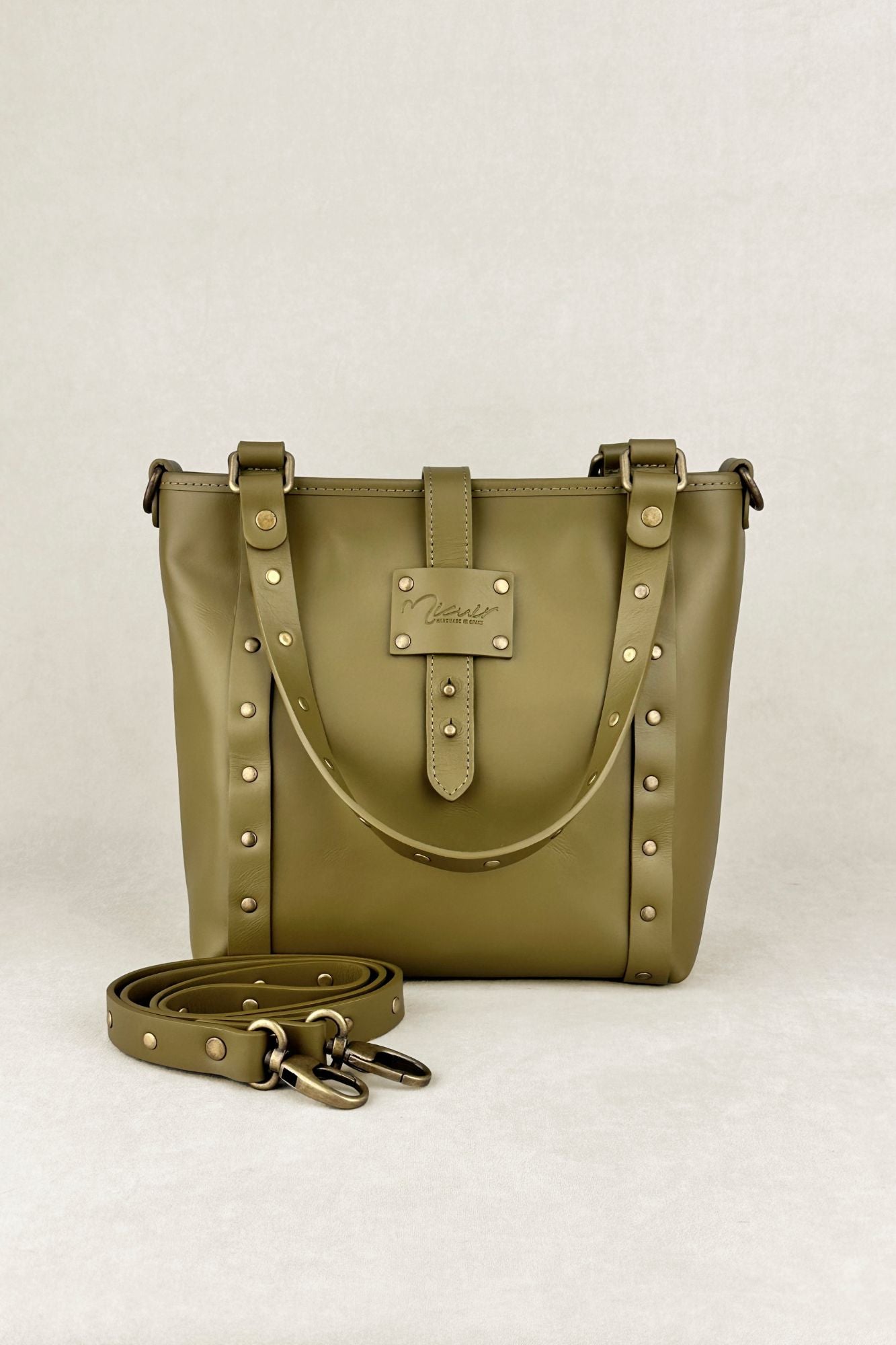 Women's green handbag with shoulder strap
