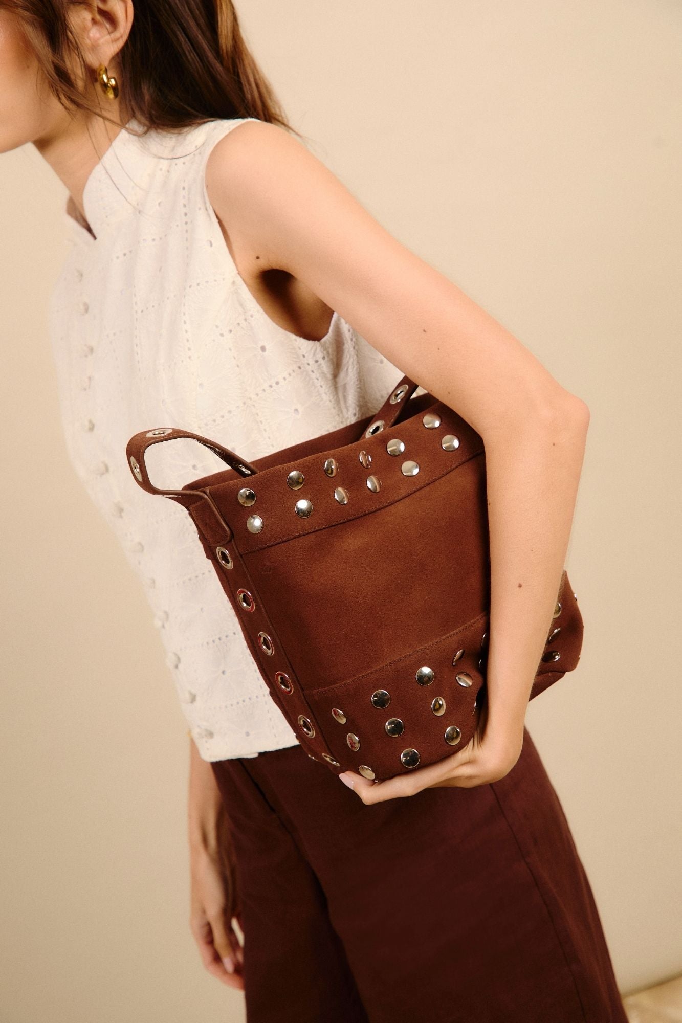 STUDDED SUEDE MINI BUCKET BAG