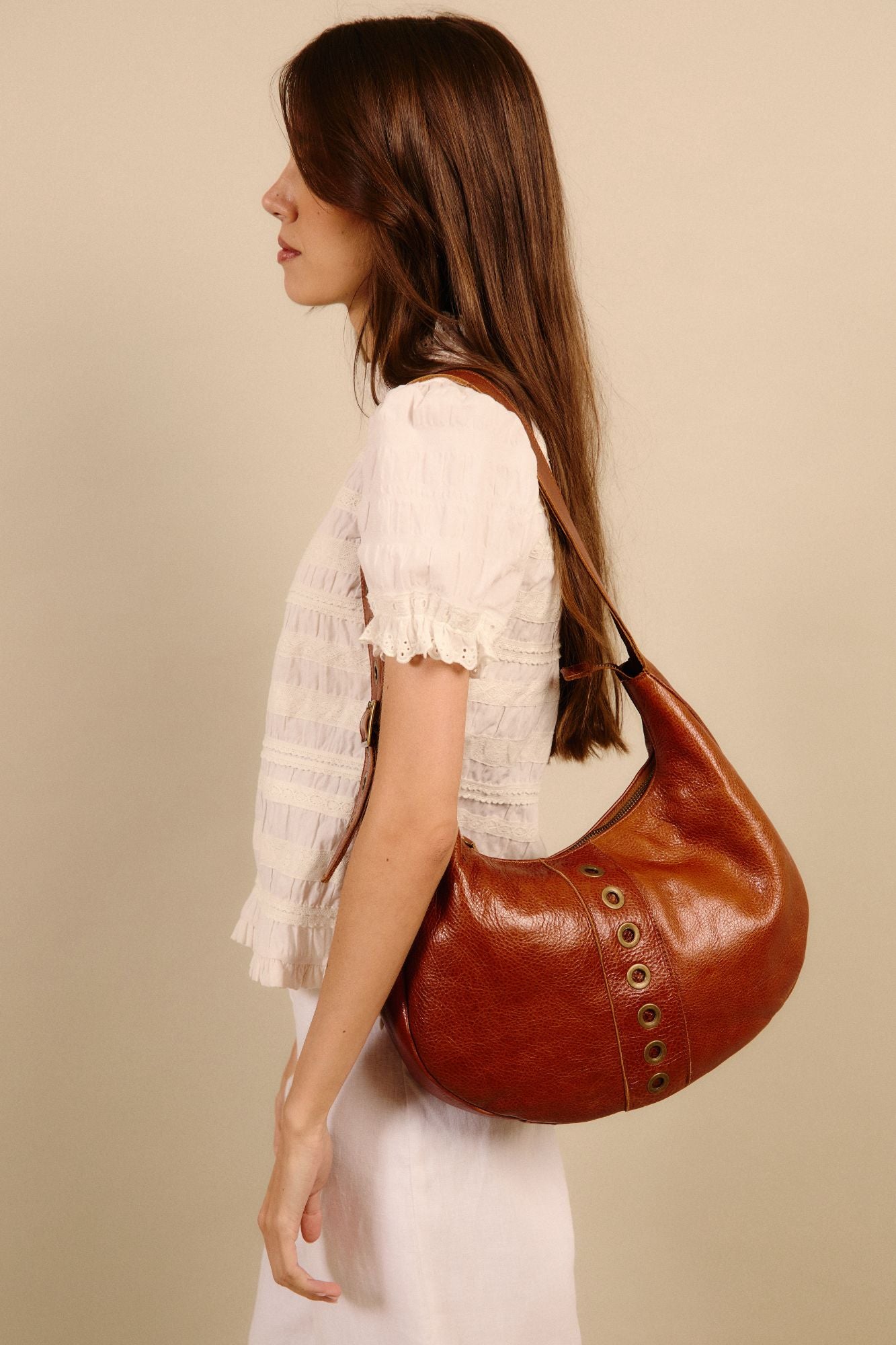 HEREA LEATHER STUDDED BAG