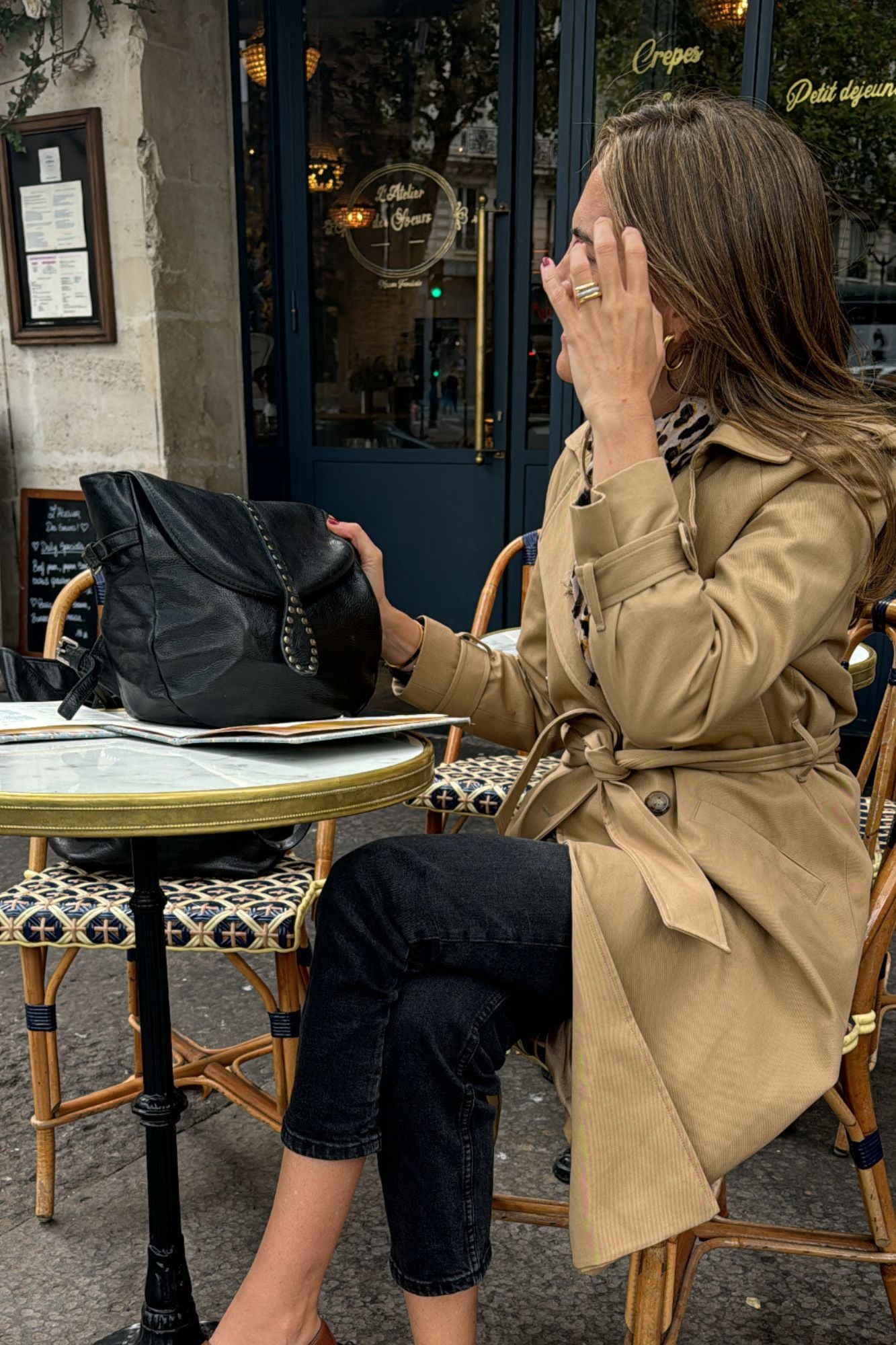 BLACK BACKPACK WITH GOLD STUDS